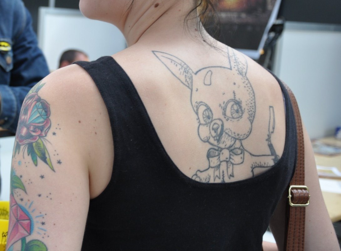 Rabbit tattoo on a woman's back